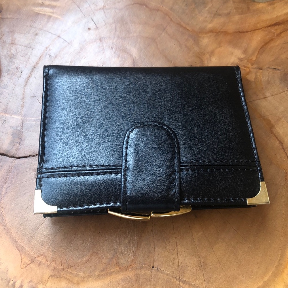 Never been used black and gold Leather wallet